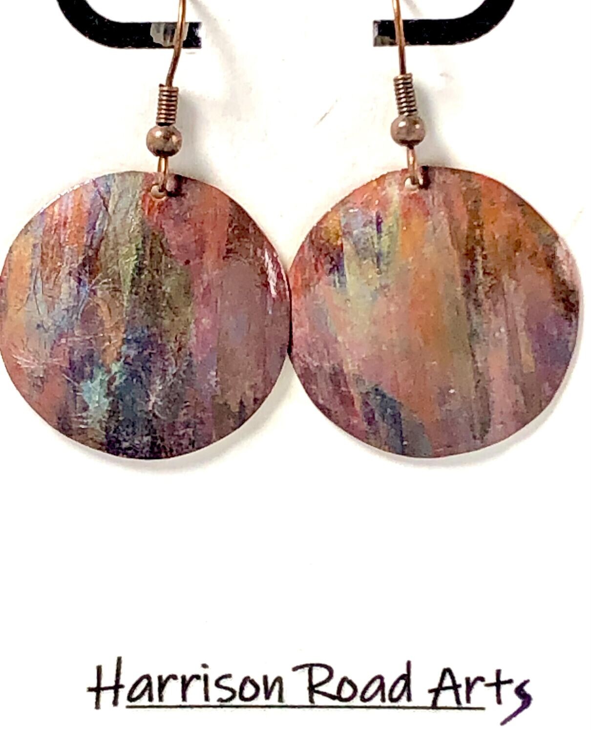 Flame painted Copper. Steel ear wires. ~ 1 inch diameter