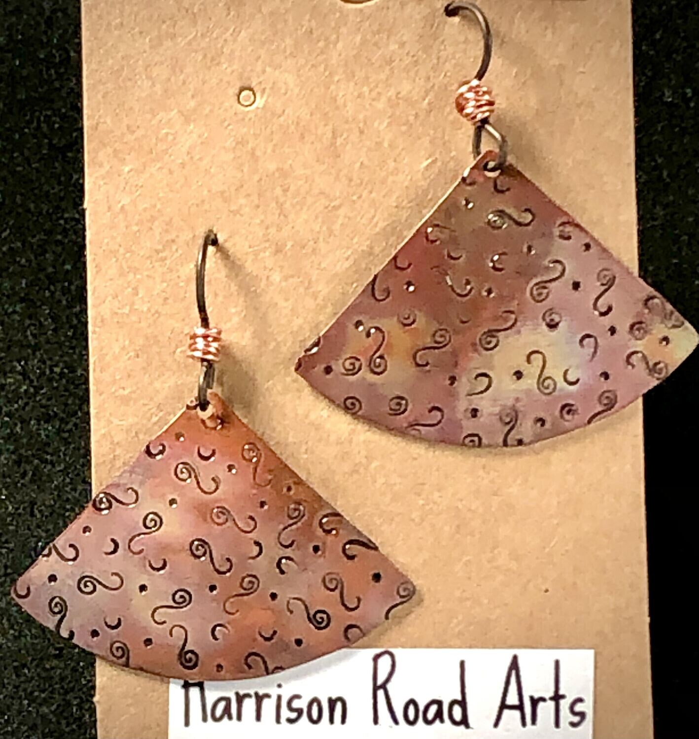 Flame painted, stamped copper. Niobium ear wires with copper wire wrapped accent. ~ 1.5inch at widest point