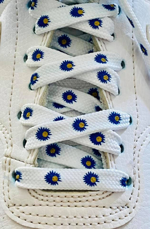 White flat laces blue daisies