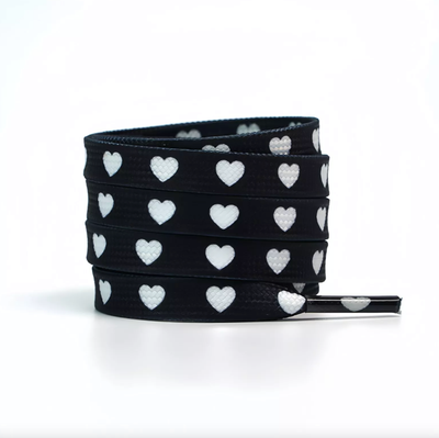 Fancy red flat shoelaces with white hearts