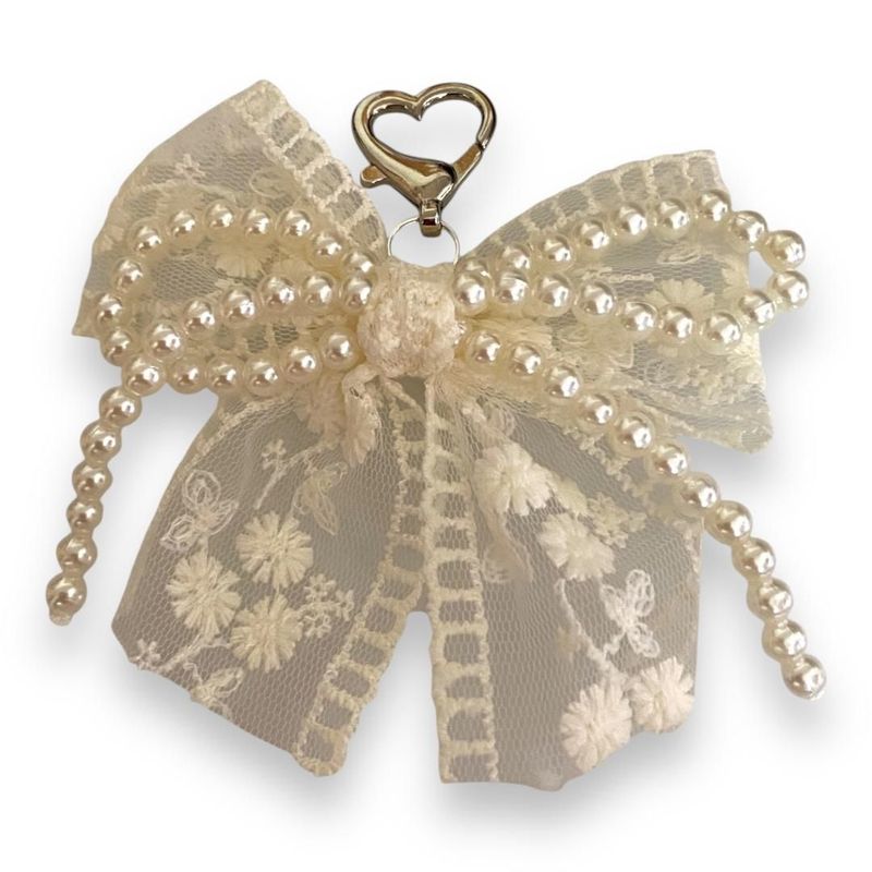 Bijoux pompon perles avec tulle brodé