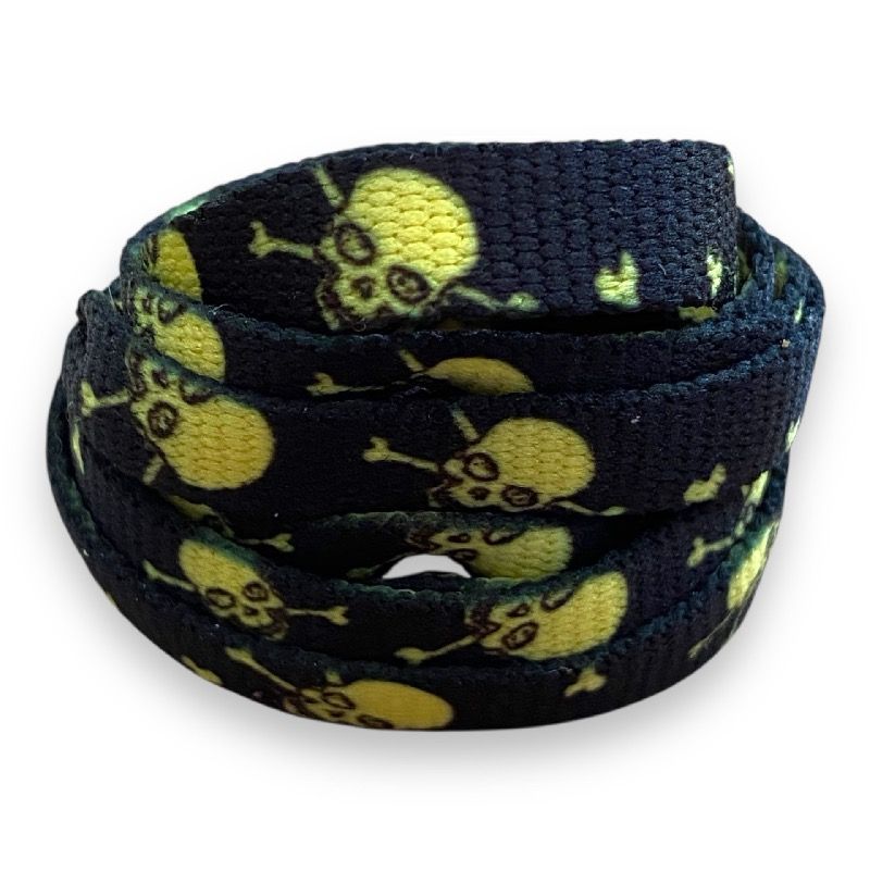 lacets plats noirs motifs têtes de mort jaunes