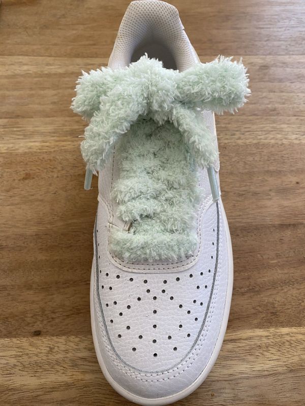 Fluffy, soft sneaker laces in Caribbean green