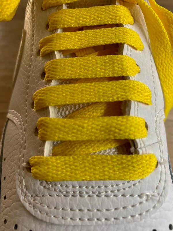 Flat yellow shoelaces for shoes and sneakers made from recycled materials