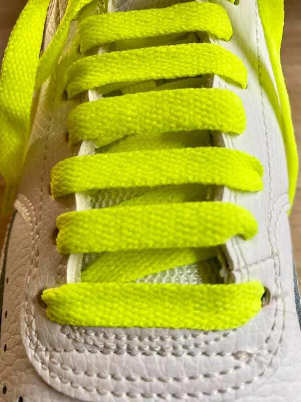 Neon yellow flat shoelaces for shoes and sneakers made from recycled materials