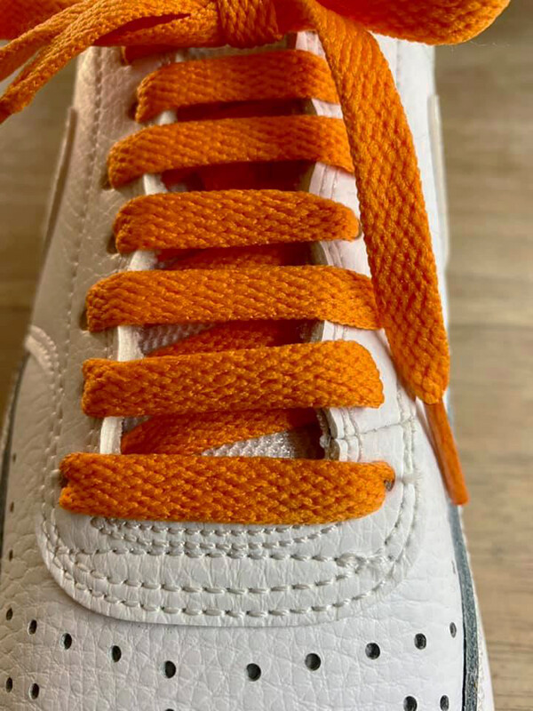 Flat orange shoelaces for shoes and sneakers made from recycled materials