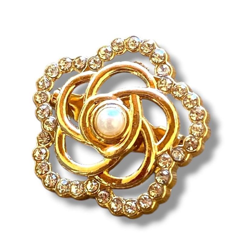 Retro-style floral and rhinestone brooch