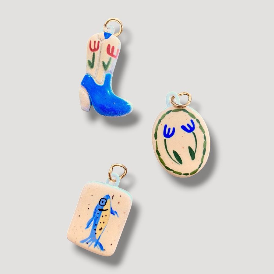 Ceramic-style charms with a Camargue theme