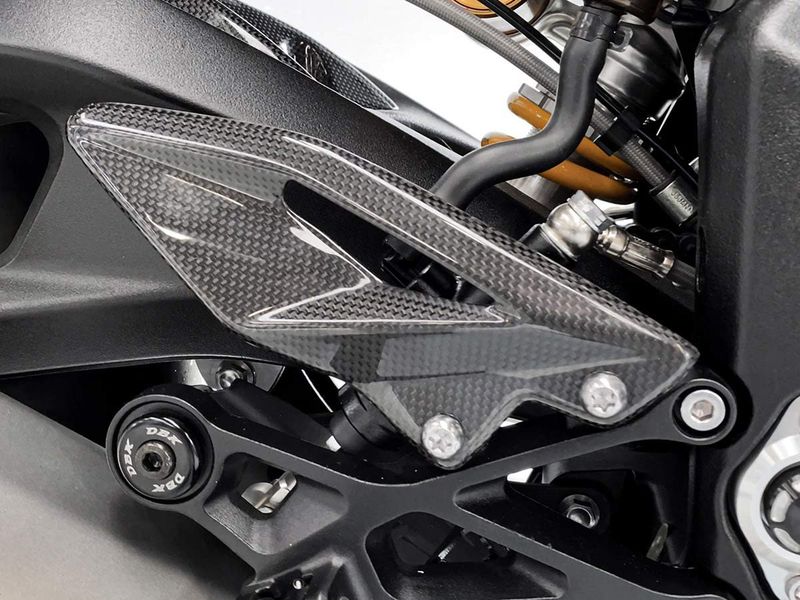 CRB90L - PROTECTORES DE TALÓN TRIUMPH STREET TRIPLE EN CARBONO BRILLANTE