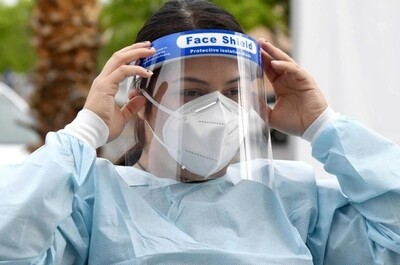 Woman wearing protective face shield.