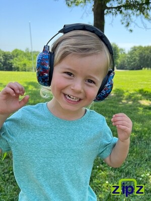 Little girl wearing ear protection.