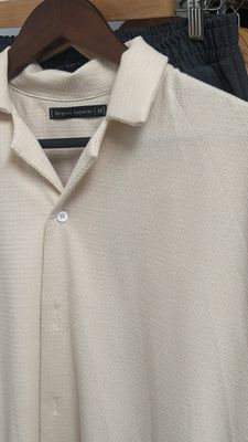 beige shirt