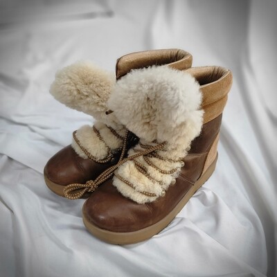 New Unworn UGG waterproof Snow Boots.