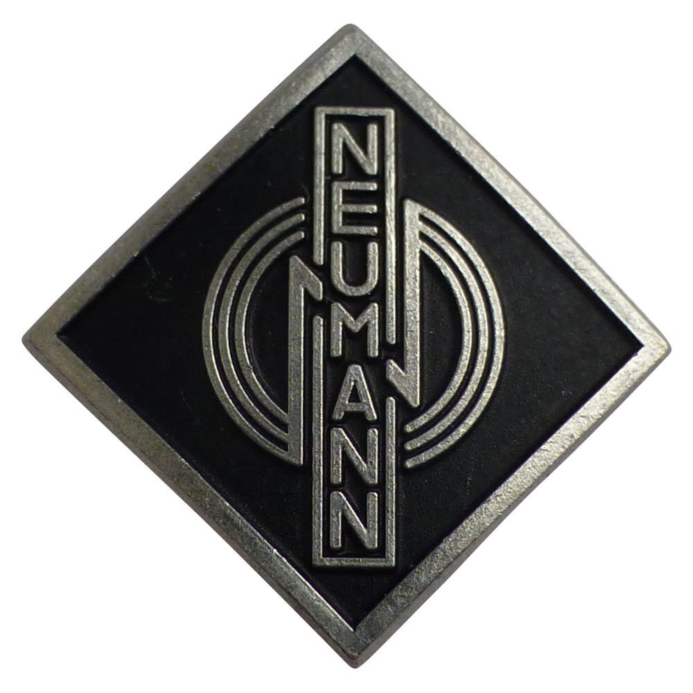 Metal alloy diamond shaped name badge Neumann 061481 with three stylised concentric rings over black on a white background