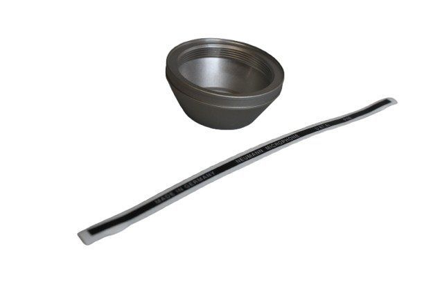 Neumann U87 AI Screw Cap in Nickel with it's label strip alongside all on a white background