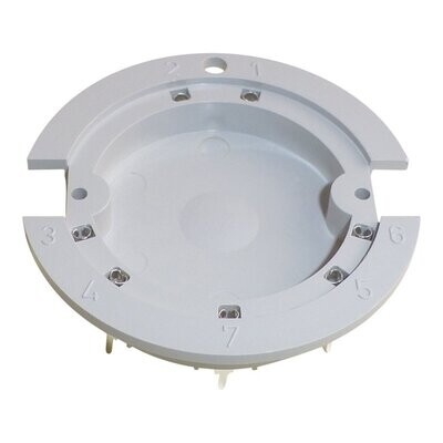 Neumann U87 grey plastic disc with central tray surrounded by seven socket holes and two screw holes diametrically opposite