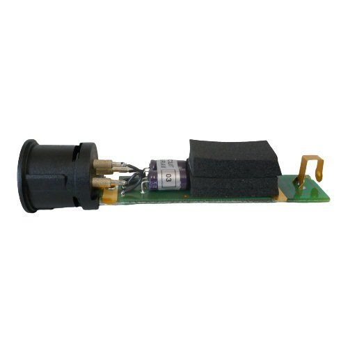 Neumann KM180 series green amplifier card with black xlr housing at one end and a golden contact pin at the other end