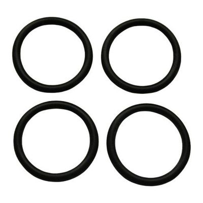 Black Four black rubber O rings on a white background