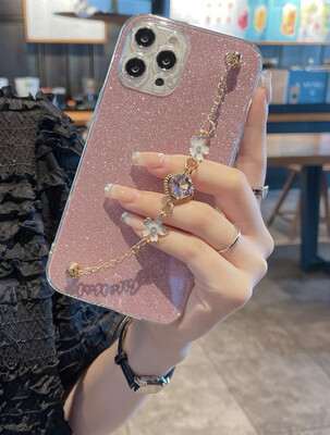 Shiny pink case with a luxurious golden handle
