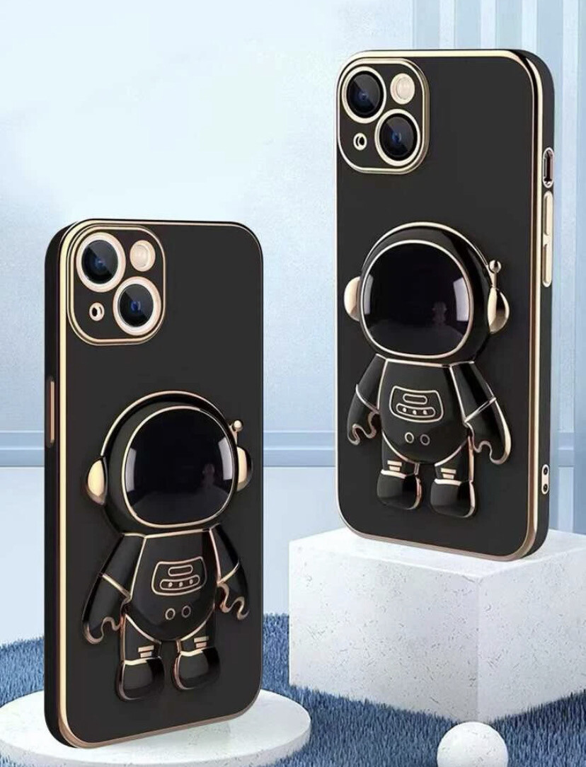 A black and gold astronaut cover with a grip and it becomes a long stand