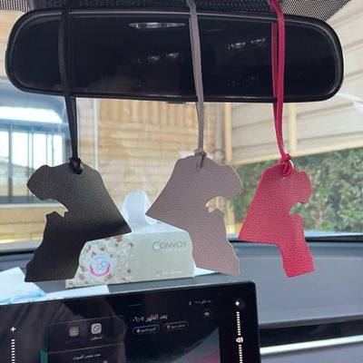 Car hangers in two shapes, a star, a map of Kuwait, distinctive colors 