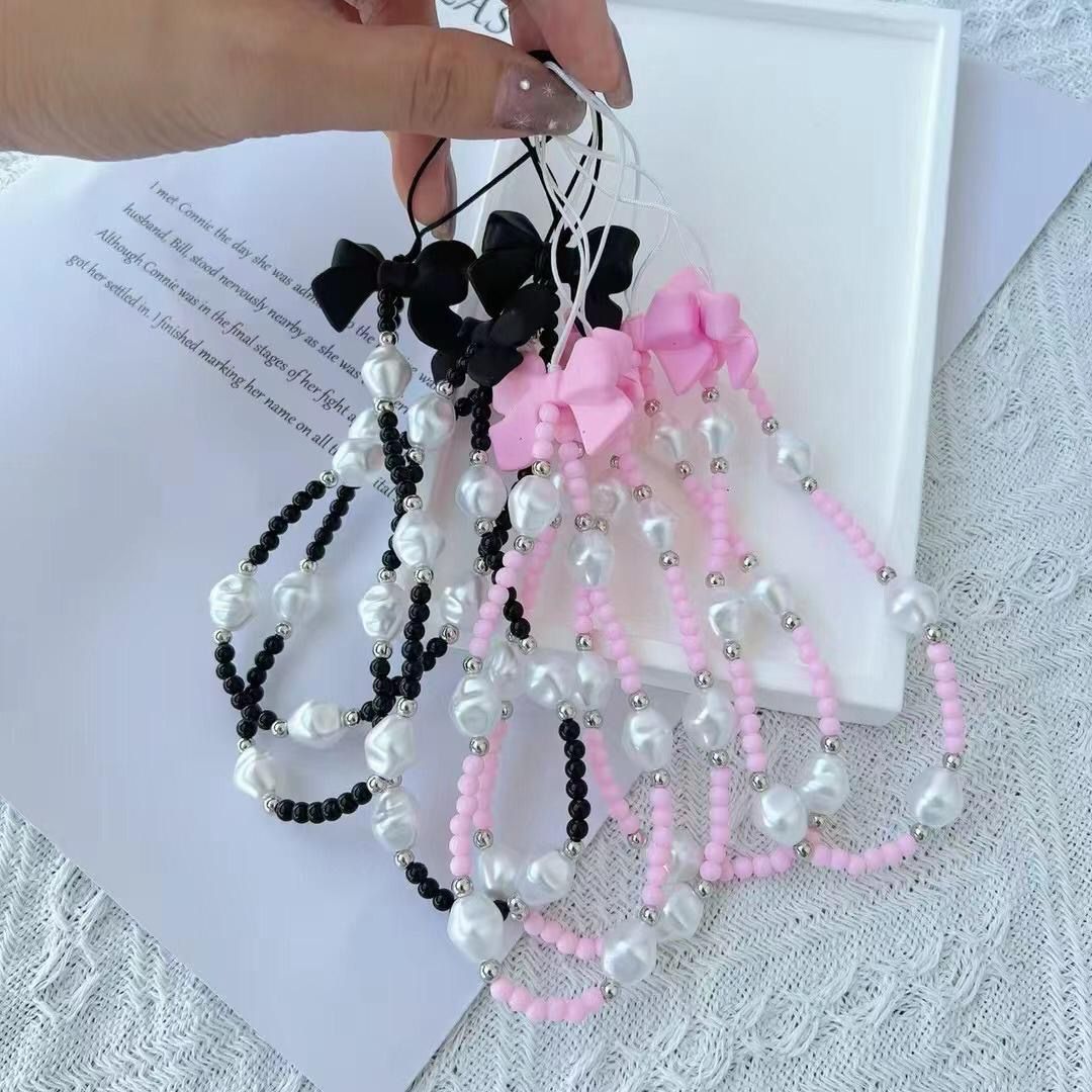 Pink and black bow phone holder or medal