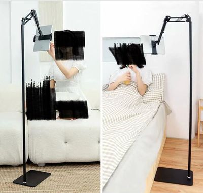 Tall floor stand with adjustable height and orientation for iPads and phones.