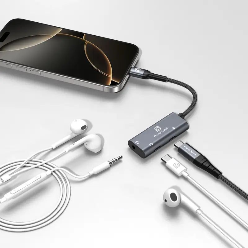 Phone Planet charging and headphone adapter with 3 Type-C ports: 1 charging port, 2 Type-C ports for headphones, and 3 AUX ports for high-quality sound and fast charging.
