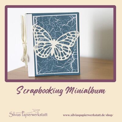 Album im Umschlag mit Schmetterling