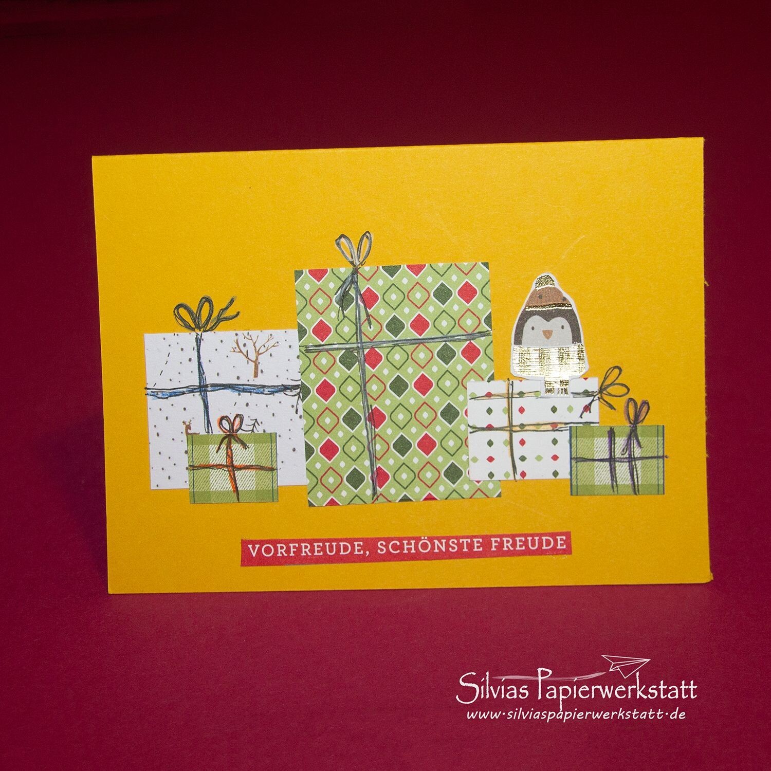 Weihnachtskarte mit Geschenkpaketen