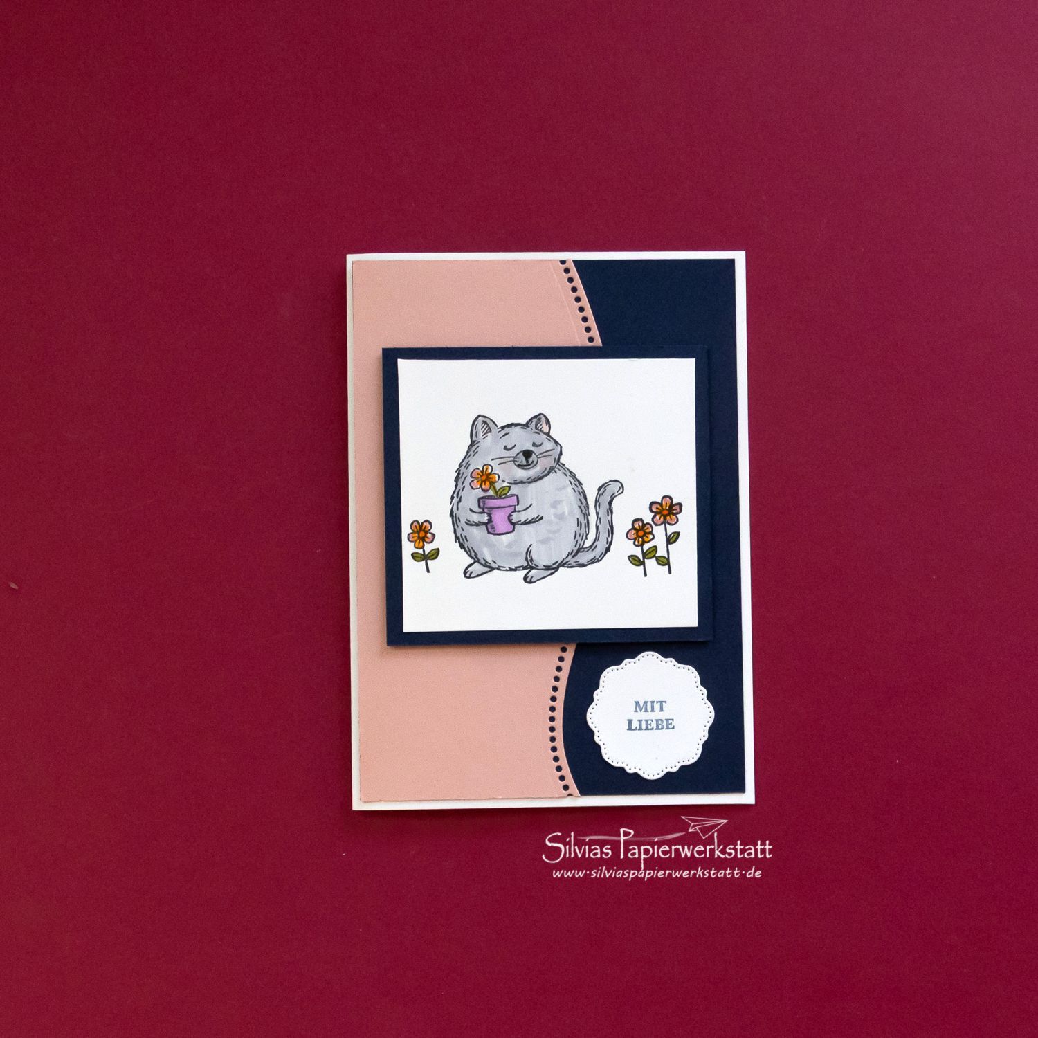 Katze mit Blumen