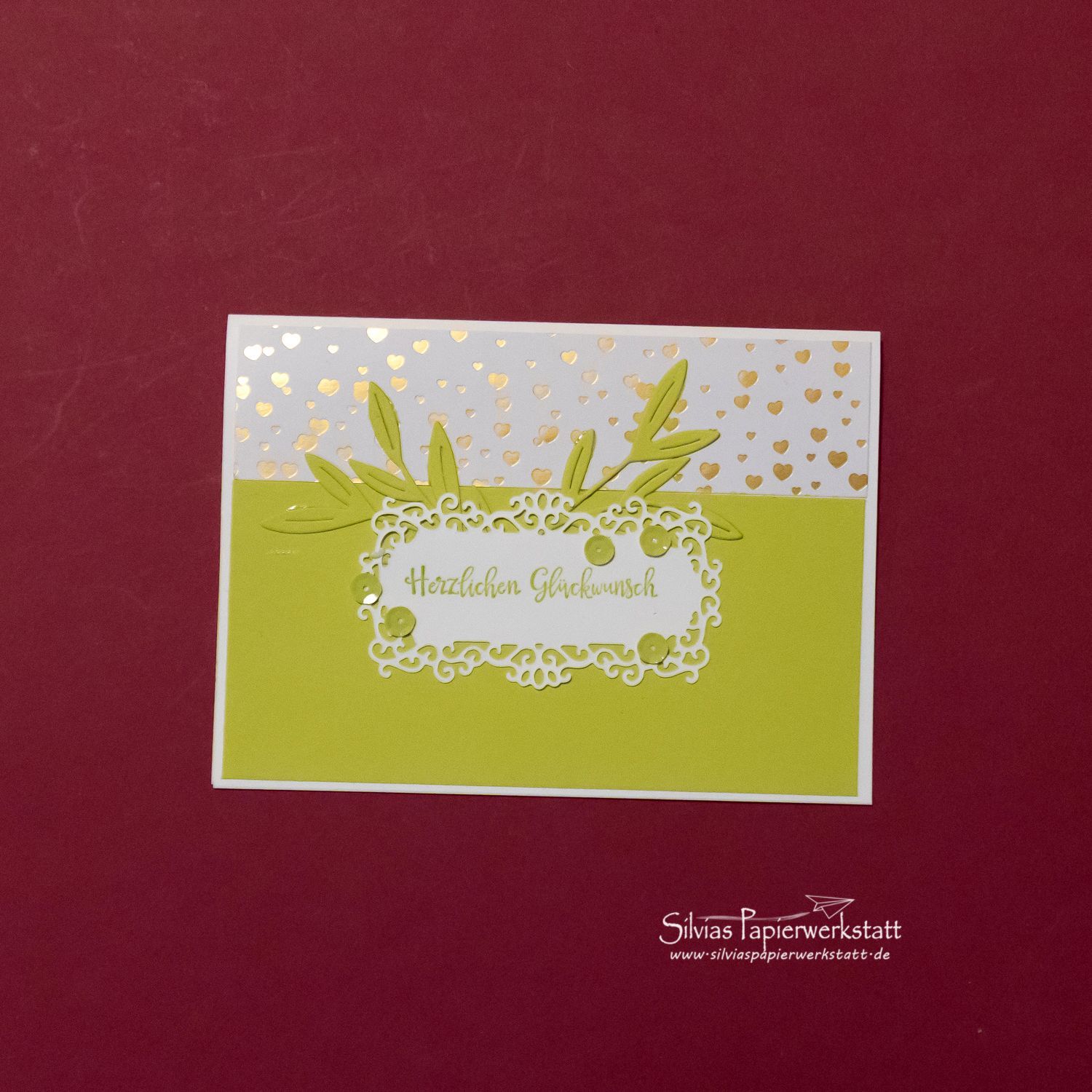 Glückwunsch mit goldenen Herzen