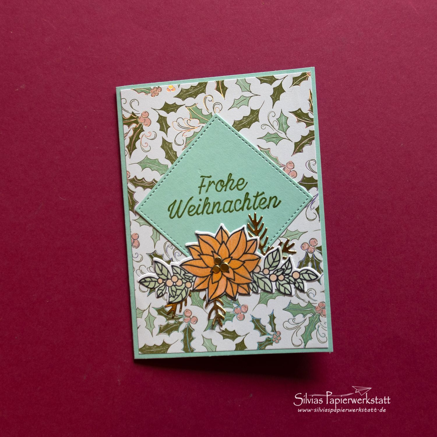 Weihnachtsstern und Illexblätter