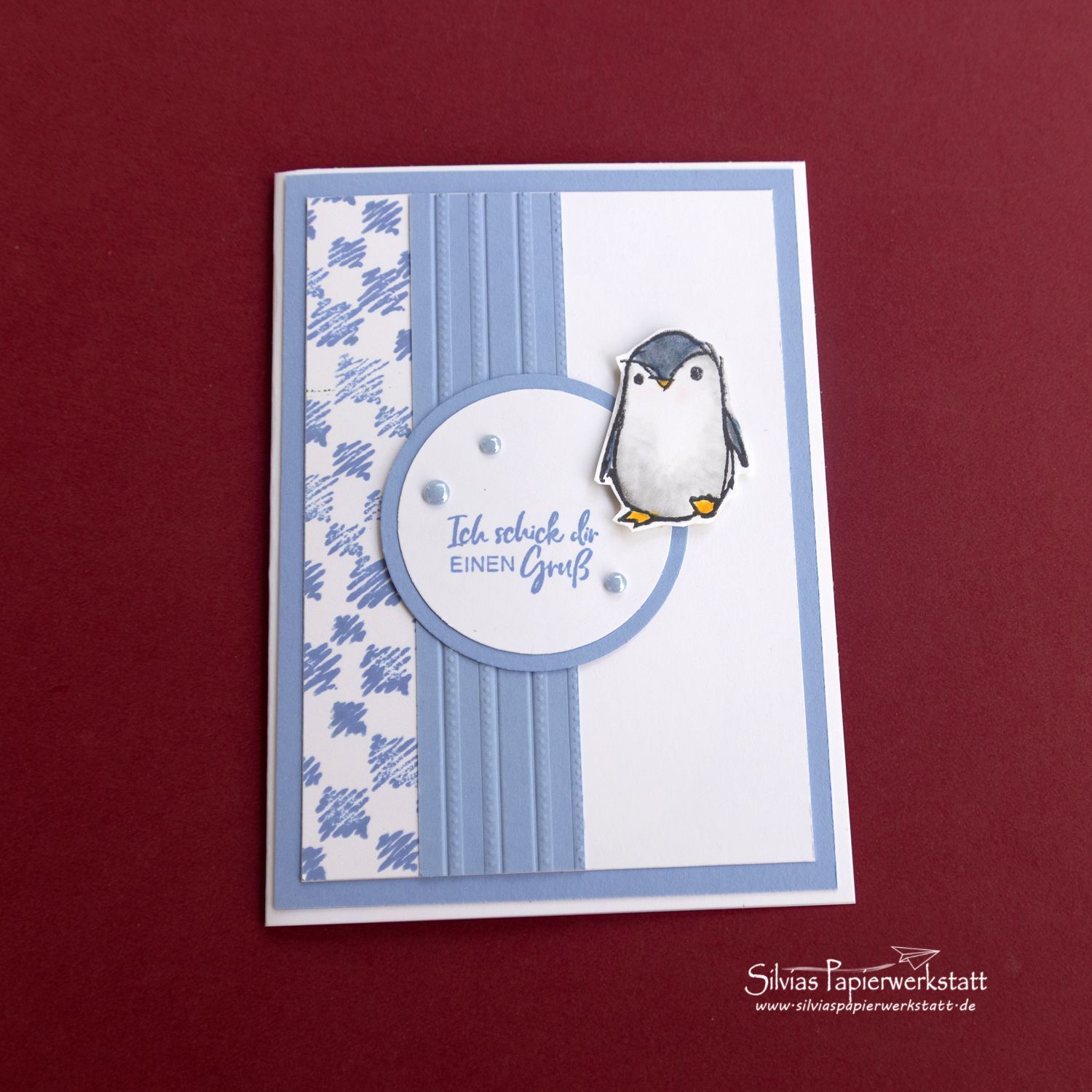 Pinguin auf blauen Mustern Pinguin auf blauen Mustern