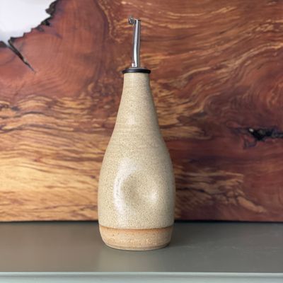 Dimple oil bottle in Dune
