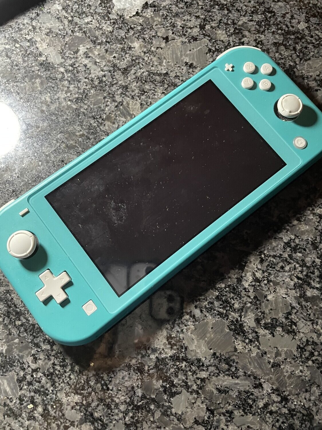 NINTENDO SWITCH ( USED ) AQUA BLUE WITH GAMES AND CASE