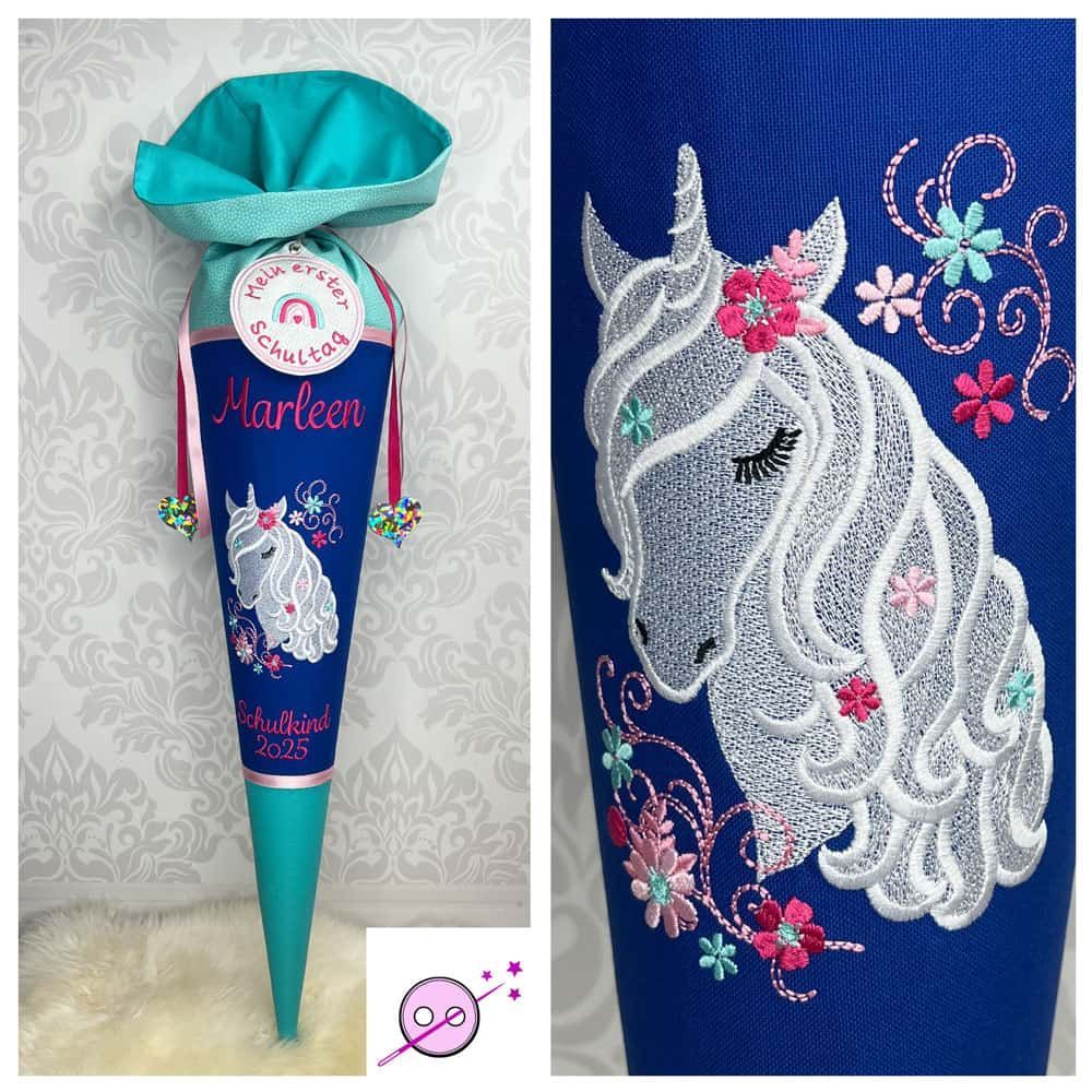 Schultüte aus Stoff, mit einem bestickten Einhorn in weiß. Die Stoffe sind blau und smaragdgrün