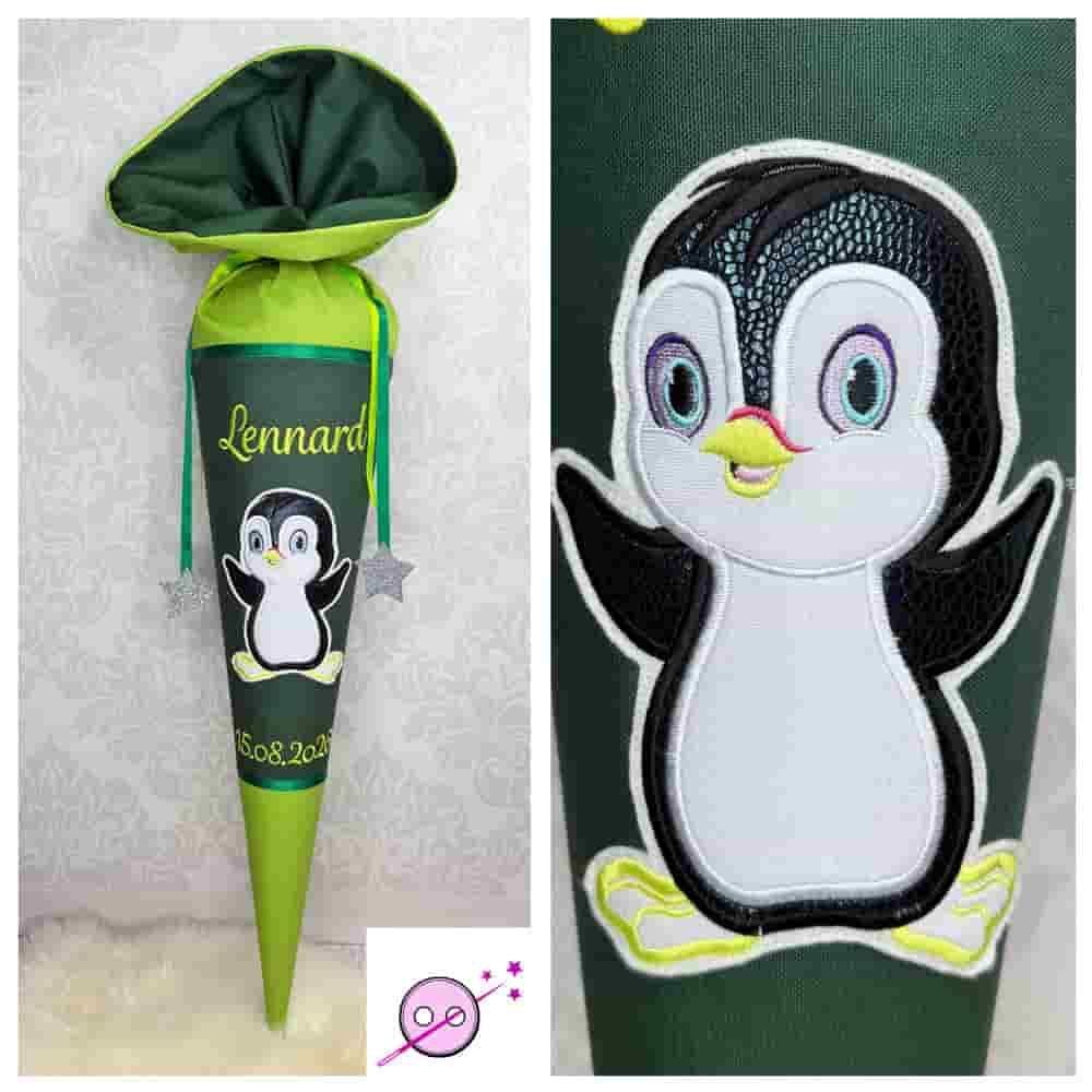 Schultüte in grün aus Stoff mit einem Pinguin.