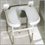 Asiento abatible en forma de U