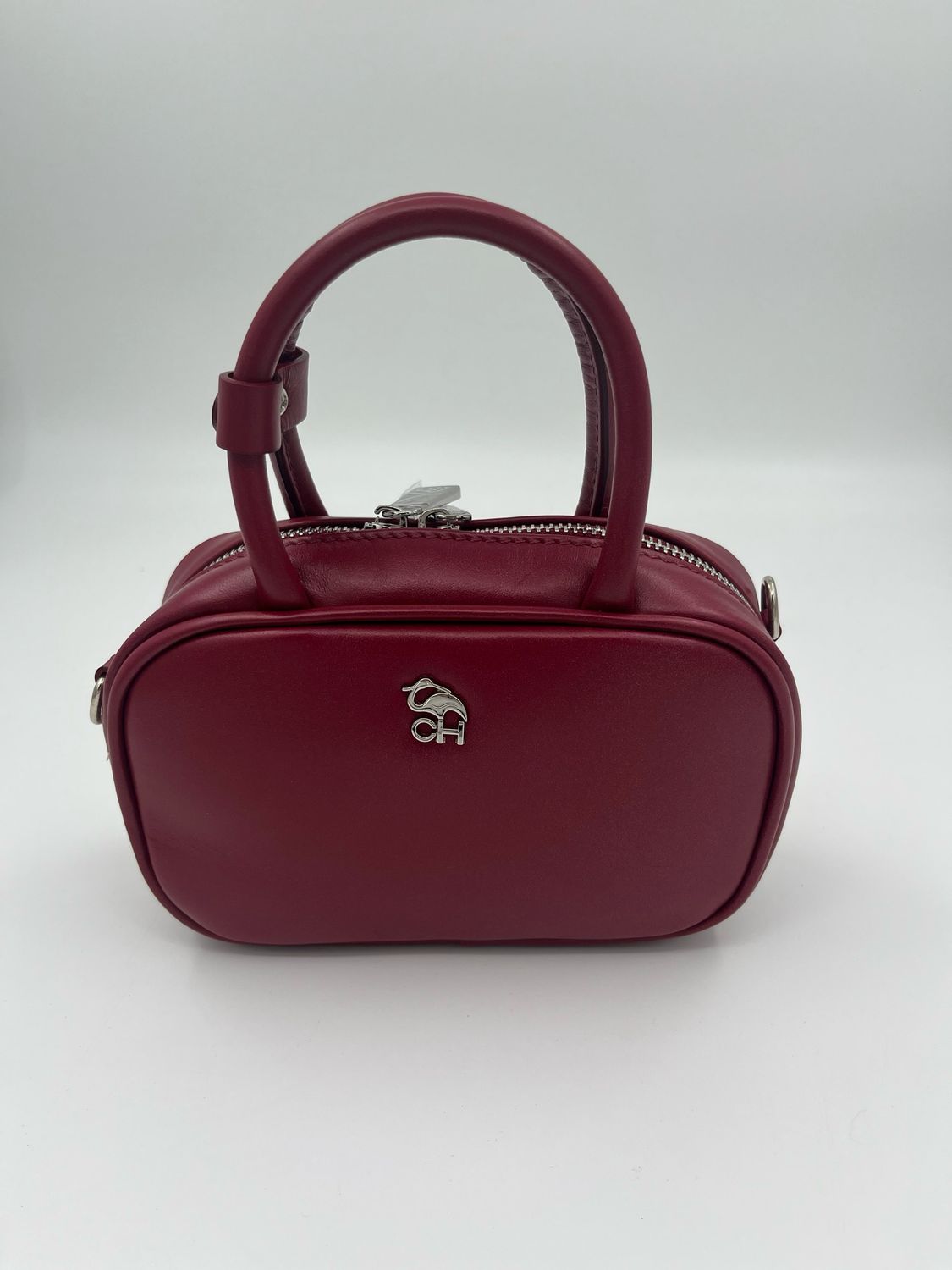 Klasvolle minibag handtas in fijn Robijnrood kalfsleder