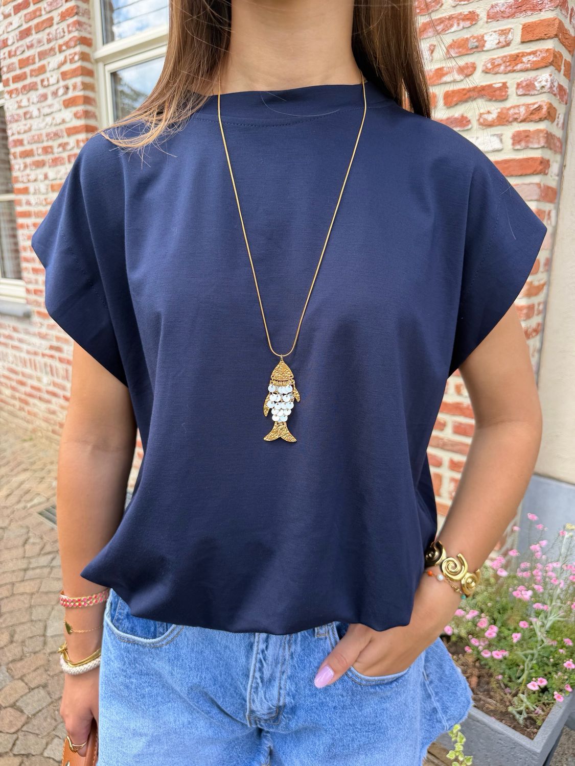 white fishy necklace