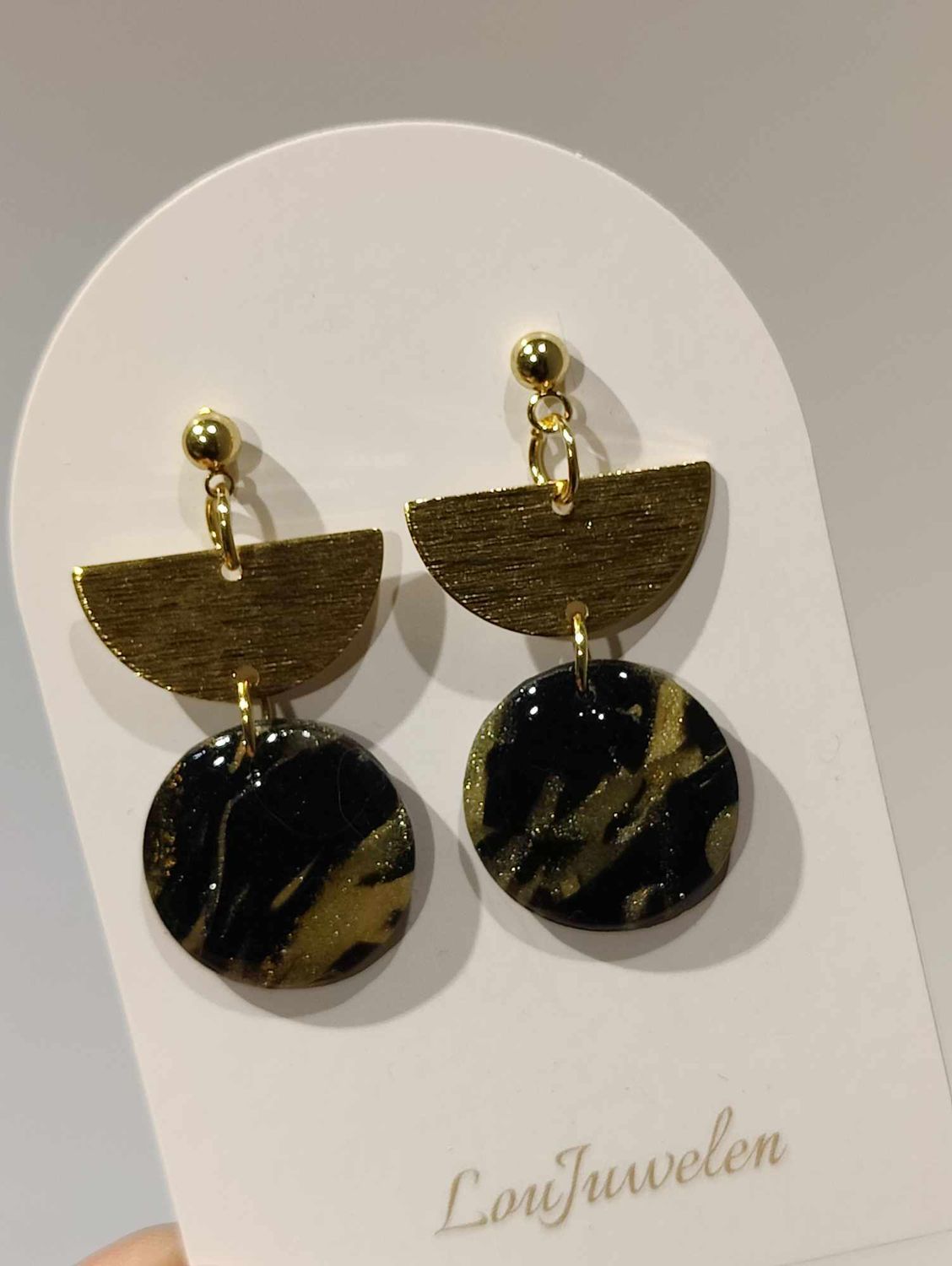 Zwart goud swirl