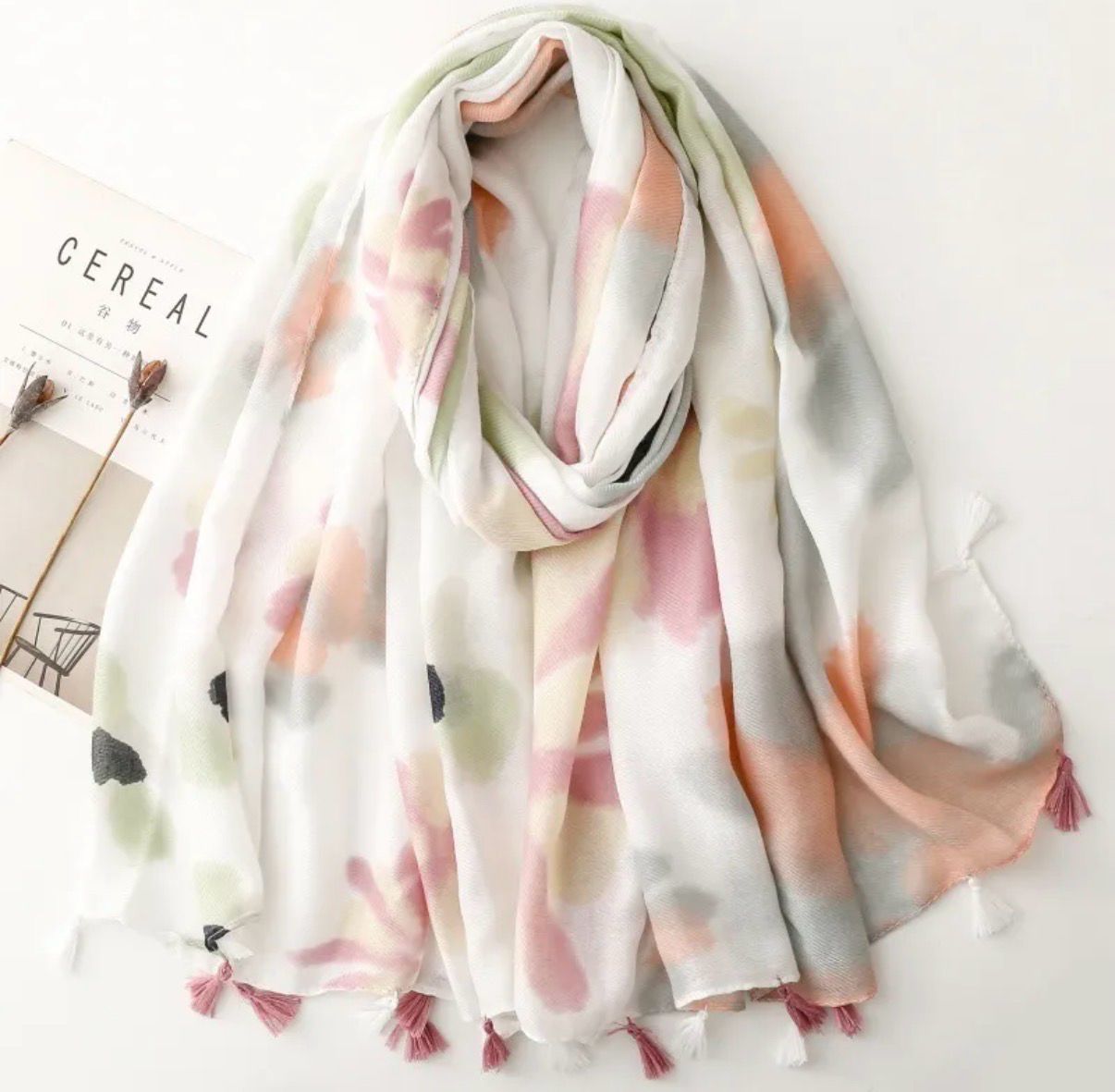 Sjaal met zachte pastelkleuren