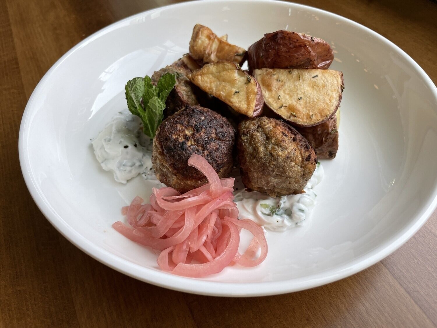 Lamb Kofta Meatballs with Roasted Gold Potatoes and steamed summer Vegetables