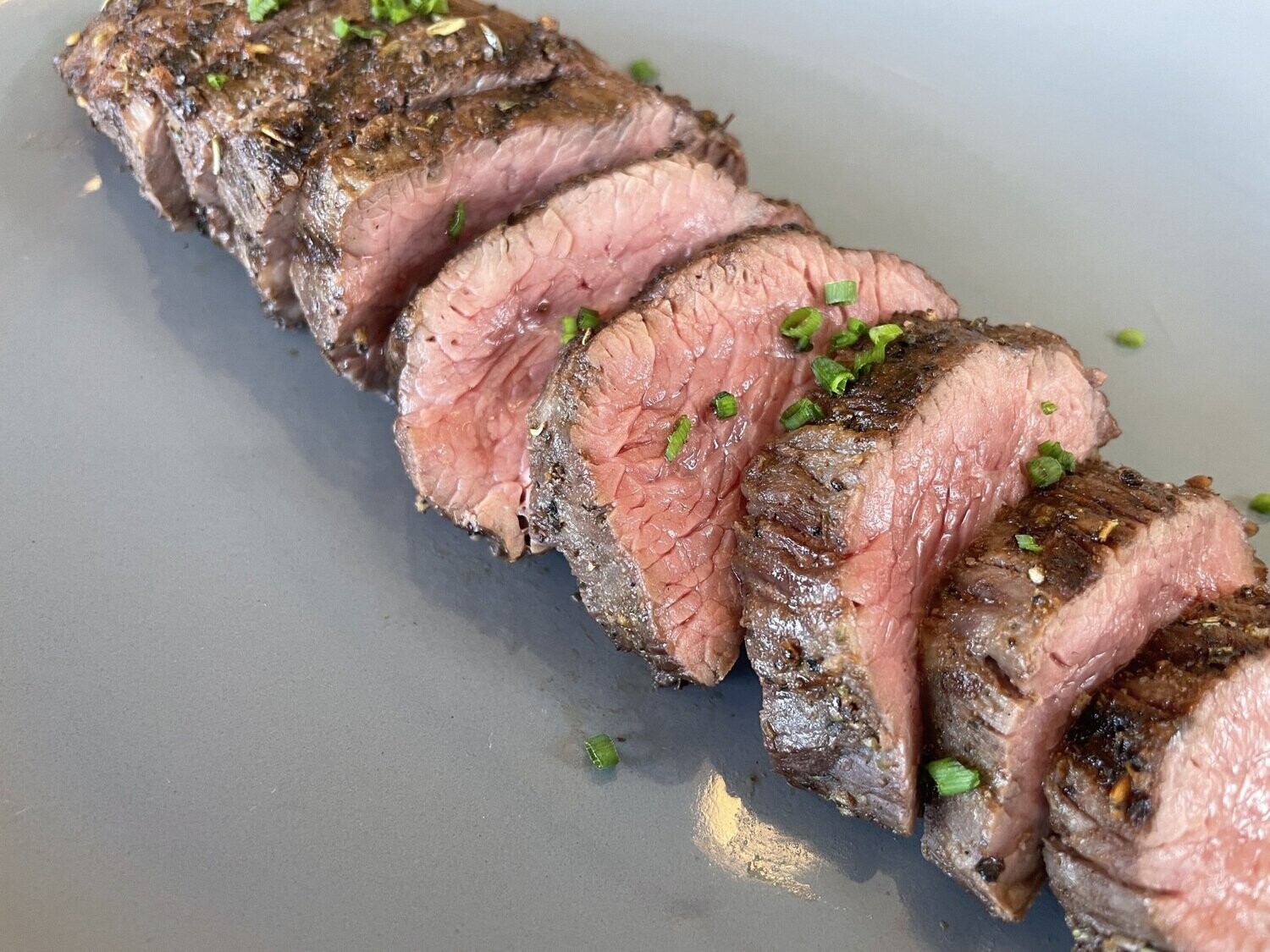 Grilled Petite Tenderloin with Chimichurri with Roasted Potatoes and Roasted Seasonal Vegetables