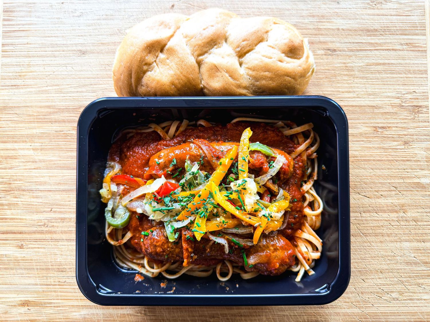 Hot Sausage with Peppers & Onions served with a Pasta Bake and a Mancini's Mini Twist - Single Serving Meal