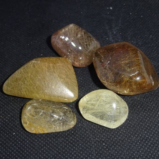 Trommelsteine: Rutil (Engelshaar) Trommelsteine: Rutil (Engelshaar)