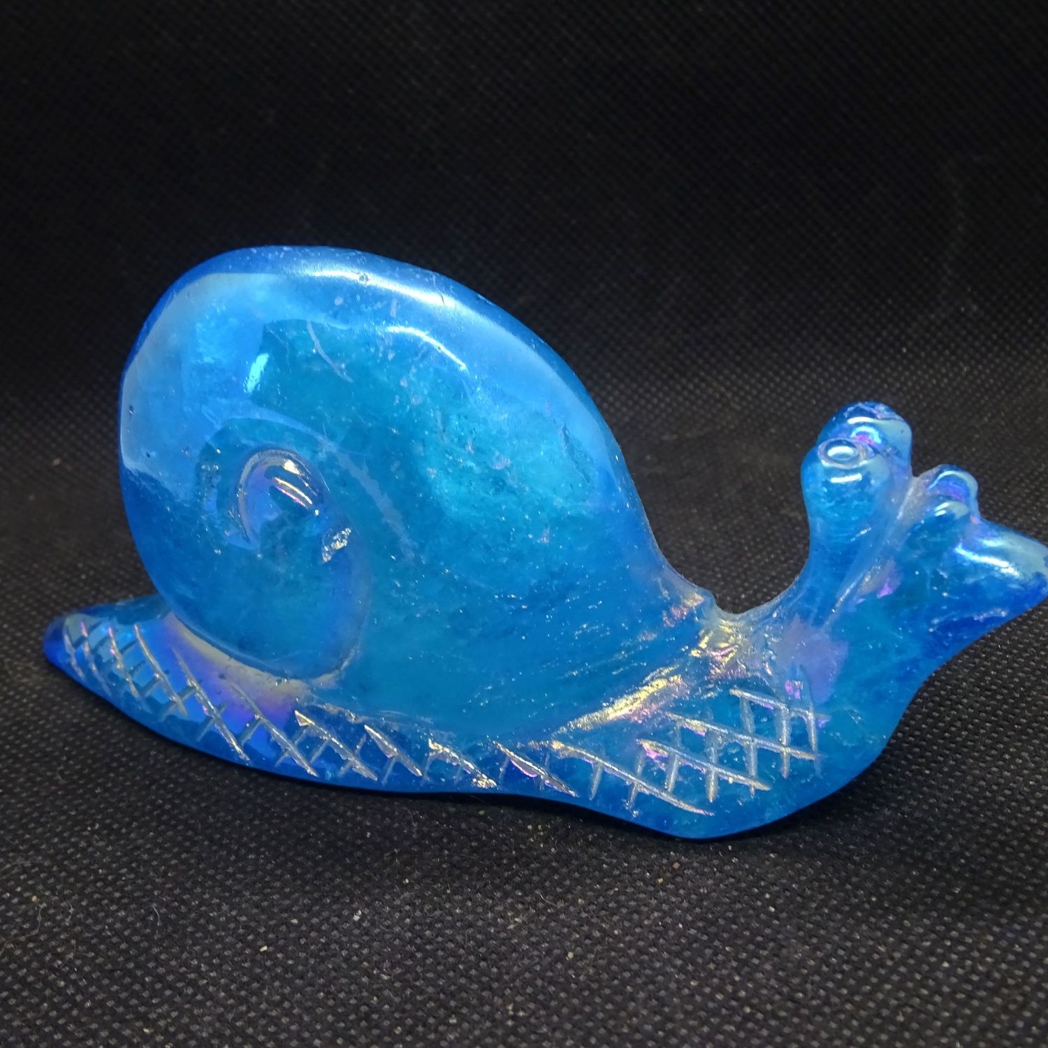 Krafttier: Schnecke aus Angel Aura Quarz