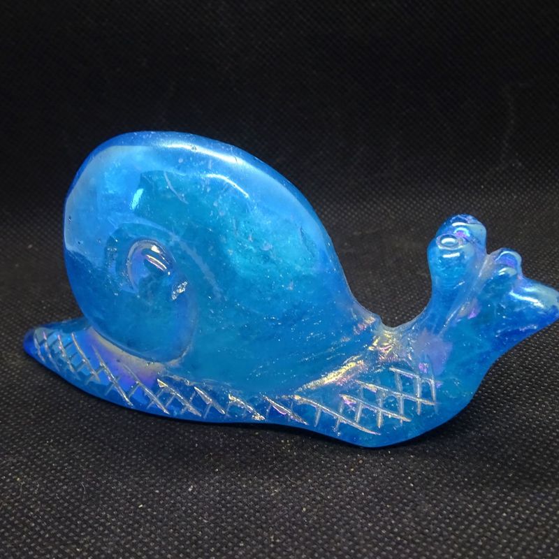 Krafttier: Schnecke aus Angel Aura Quarz Krafttier: Schnecke aus Angel Aura Quarz