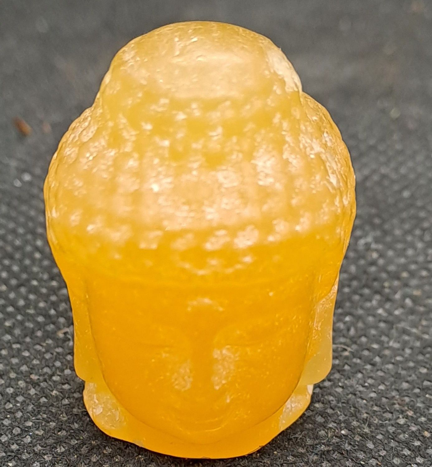Kristallschädel: Buddha aus Orangencalcit